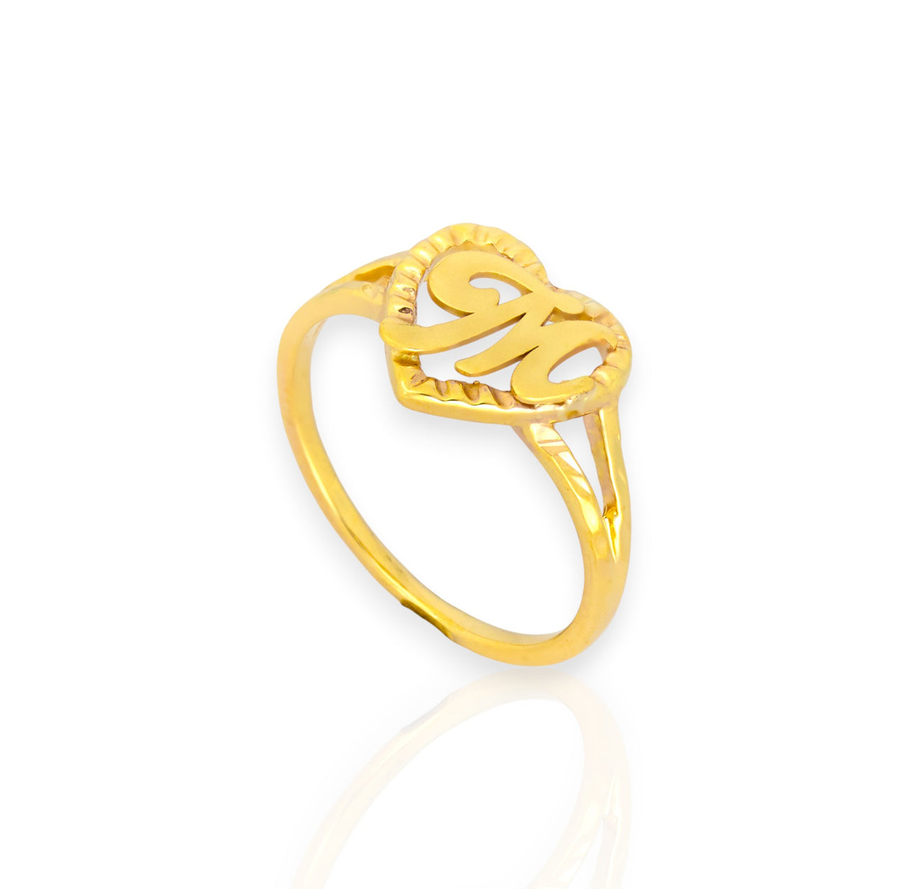 Gold ring with a heart-shaped design on a white background, custom letter ring