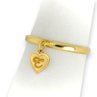 Front view of personalized ring, slim gold band with dangling heart initial pendant ring